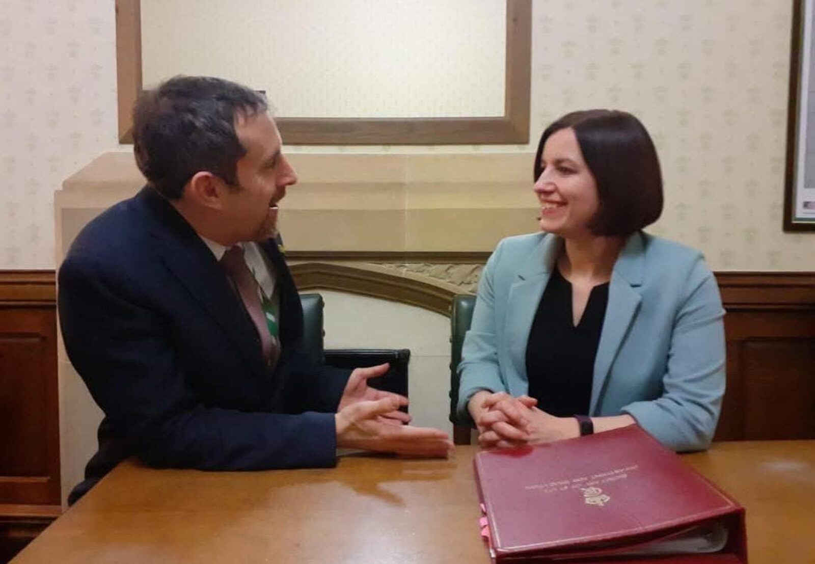 Chris sitting down with Bridget Phillipson for a meeting